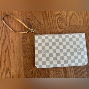 The LOUIS VUITTON Wristlet